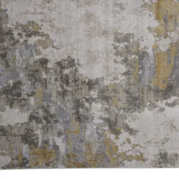 7' X 10' Ivory Gold And Gray Abstract Stain Resistant Area Rug