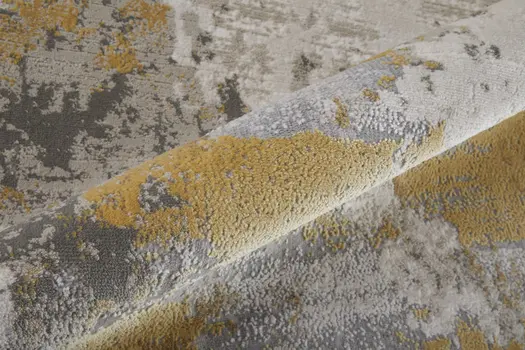 7' X 10' Ivory Gold And Gray Abstract Stain Resistant Area Rug