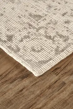 2' X 3' Ivory And Tan Abstract Hand Woven Area Rug
