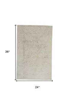 2' X 3' Ivory And Tan Abstract Hand Woven Area Rug