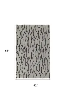 4' X 6' Taupe Black And Gray Wool Abstract Tufted Handmade Stain Resistant Area Rug