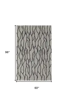 5' X 8' Taupe Black And Gray Wool Abstract Tufted Handmade Stain Resistant Area Rug