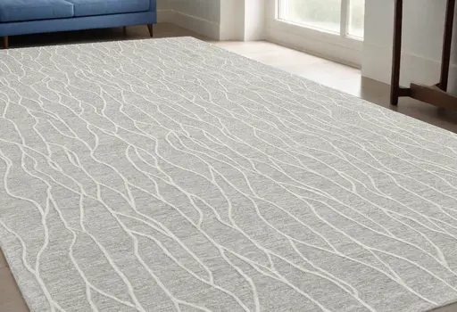 5' X 8' Taupe And Ivory Wool Abstract Tufted Handmade Stain Resistant Area Rug