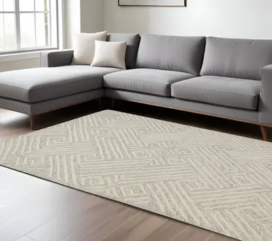 8' X 11' Tan And Ivory Wool Geometric Tufted Handmade Stain Resistant Area Rug