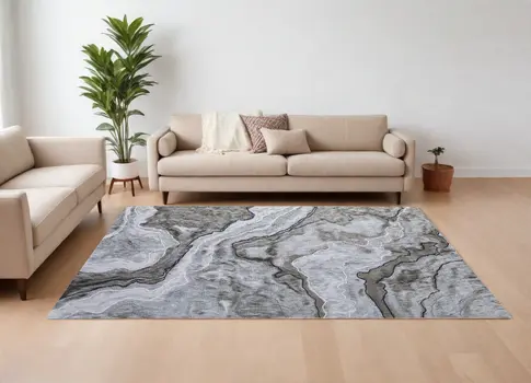 7' X 10' Ivory Blue and Gray Abstract Power Loom Area Rug