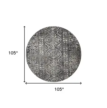 9' Black and Ivory Round Abstract Area Rug