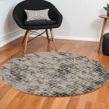 9' Ivory and Black Abstract Round Rug