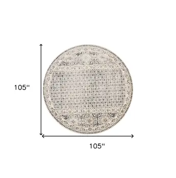 9' Ivory and Black Round Abstract Area Rug