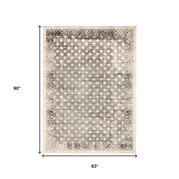 5' X 8' Ivory and Black Abstract Geometric Area Rug