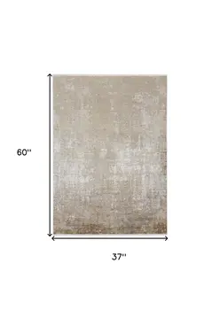 3' X 5' Gold and Ivory Abstract Power Loom Distressed Area Rug With Fringe