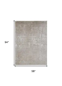 5' X 8' Tan Ivory And Gray Abstract Power Loom Distressed Area Rug With Fringe