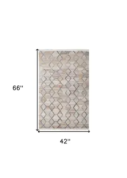 4' X 6' Gray Ivory And Tan Geometric Hand Woven Stain Resistant Area Rug With Fringe