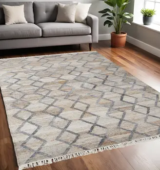 5' X 8' Gray and Ivory Geometric Hand Woven Area Rug With Fringe