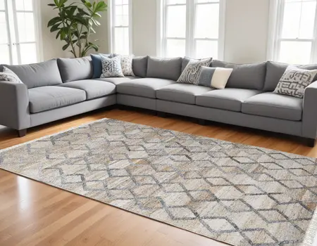 10' X 13' Gray Ivory And Tan Geometric Hand Woven Stain Resistant Area Rug With Fringe