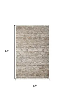 5' X 8' Tan and Gray Geometric Hand Woven Area Rug With Fringe