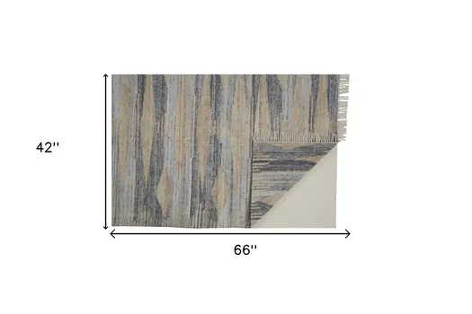 4' X 6' Gray Tan And Silver Abstract Hand Woven Stain Resistant Area Rug With Fringe