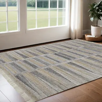 2' X 3' Tan Gray And Taupe Geometric Hand Woven Stain Resistant Area Rug With Fringe