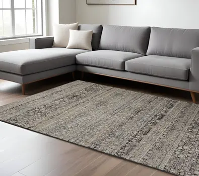 7' X 10' Gray Ivory And Tan Abstract Distressed Area Rug With Fringe
