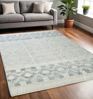 5' X 8' Ivory and Blue Geometric Hand Knotted Area Rug