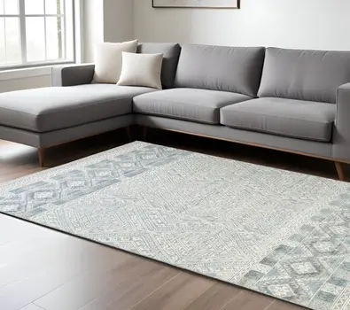 10' X 13' Ivory and Blue Geometric Hand Knotted Area Rug