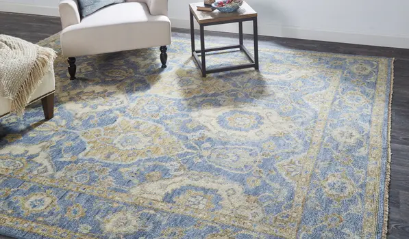 5' X 8' Blue Gold And Tan Wool Floral Hand Knotted Stain Resistant Area Rug With Fringe