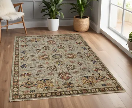 4' X 6' Gray and Ivory Wool Floral Hand Knotted Area Rug With Fringe