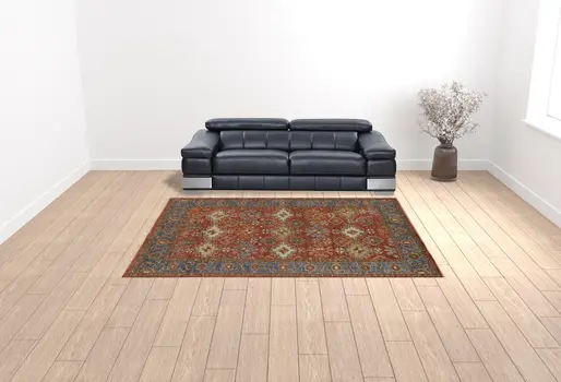 9' X 12' Red Blue And Orange Wool Floral Hand Knotted Stain Resistant Area Rug With Fringe