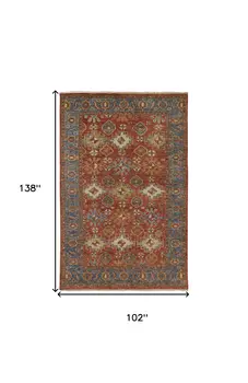 9' X 12' Red Blue And Orange Wool Floral Hand Knotted Stain Resistant Area Rug With Fringe