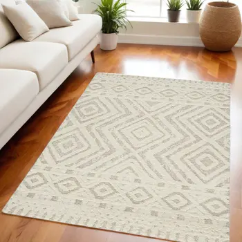 5' X 8' Ivory And Tan Wool Geometric Tufted Handmade Stain Resistant Area Rug