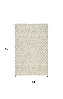 2' X 3' Ivory And Tan Wool Geometric Tufted Handmade Stain Resistant Area Rug
