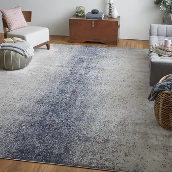 5' X 8' Ivory and Blue Abstract Power Loom Non Skid Area Rug