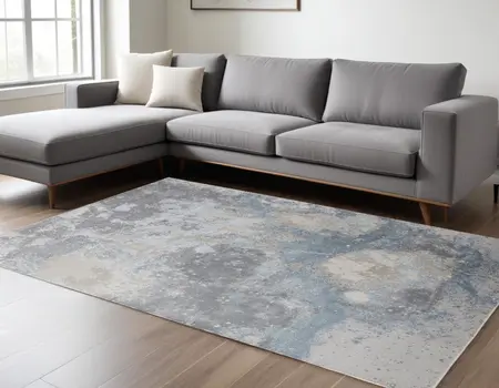 8' X 10' Ivory Blue and Gray Abstract Area Rug