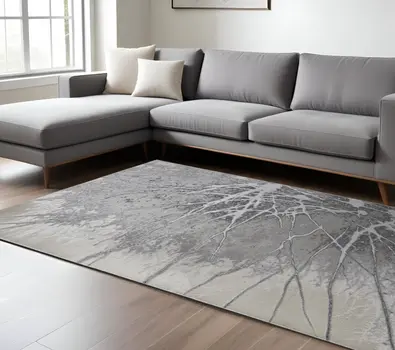 8' X 10' Gray Silver And Ivory Abstract Power Loom Area Rug