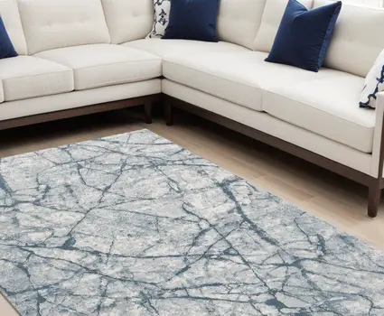 8' X 10' Blue Gray And Ivory Abstract Distressed Stain Resistant Area Rug