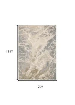 7' X 10' Ivory Silver And Gold Abstract Stain Resistant Area Rug