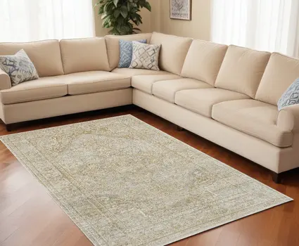 10' X 13' Ivory And Gold Floral Stain Resistant Area Rug