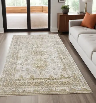 5' X 8' Gold And Ivory Floral Stain Resistant Area Rug