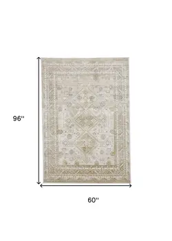 5' X 8' Gold And Ivory Floral Stain Resistant Area Rug