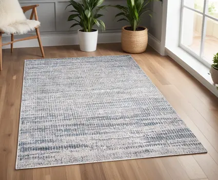 4' X 6' Blue and Ivory Abstract Non Skid Area Rug