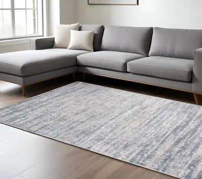 7' X 10' Blue and Ivory Abstract Non Skid Area Rug