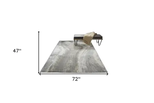 4' X 6' Gray Ivory And Blue Abstract Area Rug