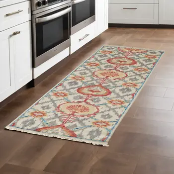 8' Orange and Ivory Wool Floral Hand Knotted Runner Rug With Fringe
