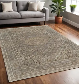 5' X 8' Tan Brown And Ivory Floral Power Loom Distressed Area Rug