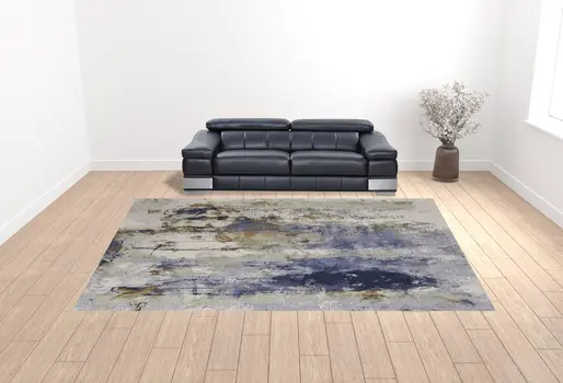 12' X 15' Blue Orange And Ivory Abstract Power Loom Area Rug