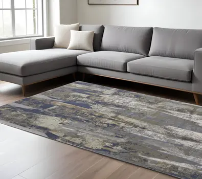 12' X 15' Blue Gray And Tan Abstract Power Loom Distressed Area Rug