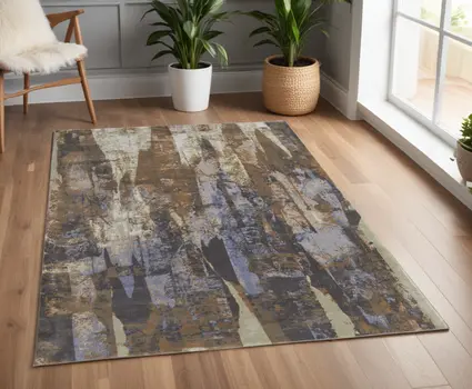 4' X 6' Blue and Ivory Abstract Power Loom Distressed Area Rug