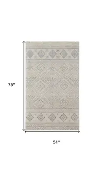 4' X 6' Ivory And Blue Geometric Power Loom Distressed Area Rug