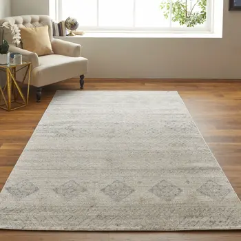 4' X 6' Ivory And Blue Geometric Power Loom Distressed Area Rug