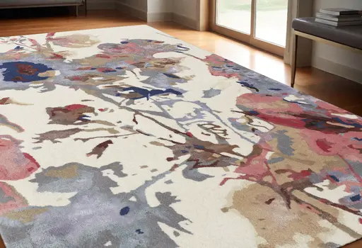 5' X 8' Ivory and Blue Wool Floral Hand Tufted Area Rug