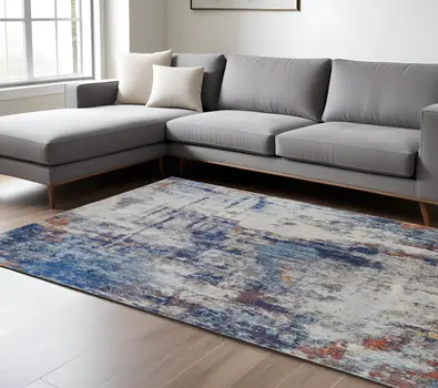 8' X 10' Ivory and Blue Abstract Power Loom Distressed Non Skid Area Rug